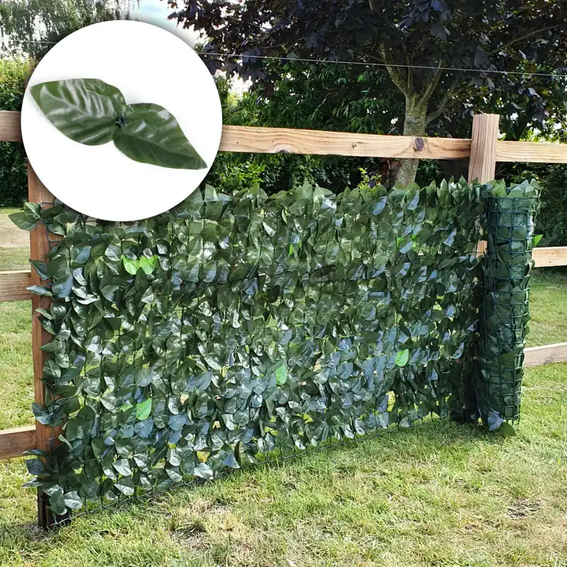 Gard artificial decorativ 50×500 cm, frunze ornamentale, protectie UV si intemperii, plastic PVC, verde inchis Discount